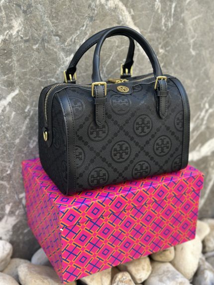 Tory Burch مع البوكس